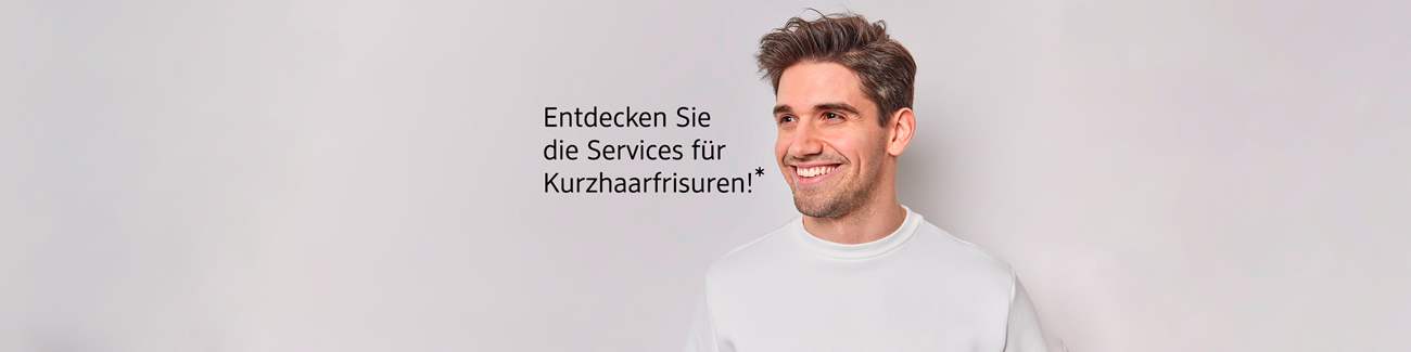  Mann: Lachender Mann, seitlich schauend